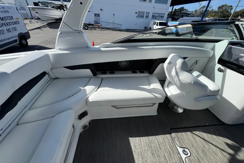 Slide: The Image of 2026 Four Winns HD8 OB boat interior with white seating and modern design. - 22