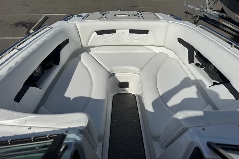 Slide: The Image of 2026 Four Winns HD8 OB boat interior with white seating and modern design. - 29