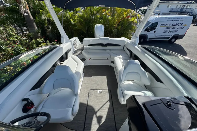 Slide: The Image of 2026 Four Winns HD8 OB boat interior with white seating and modern design. - 34
