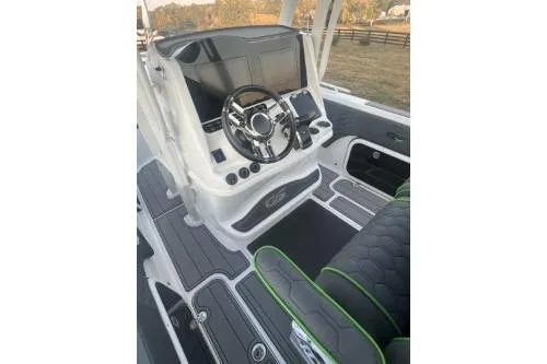 Slide: The Image of 2023 Glasstream 328 SCX boat cockpit with modern steering and controls. - 20