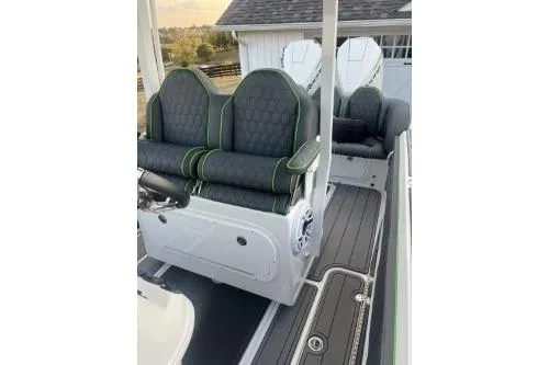 Slide: The Image of 2023 Glasstream 328 SCX boat interior with stylish seating and modern design. - 30
