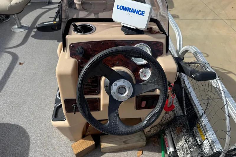 Slide: The Image of 2019 Sun Tracker Bass Buggy 18 DLX steering console with Lowrance GPS and gauges. - 7