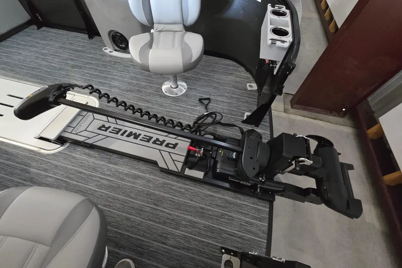 Slide: The Image of Interior of 2026 Premier 230 Sunsation Angler 4pt boat with seating and equipment. - 16