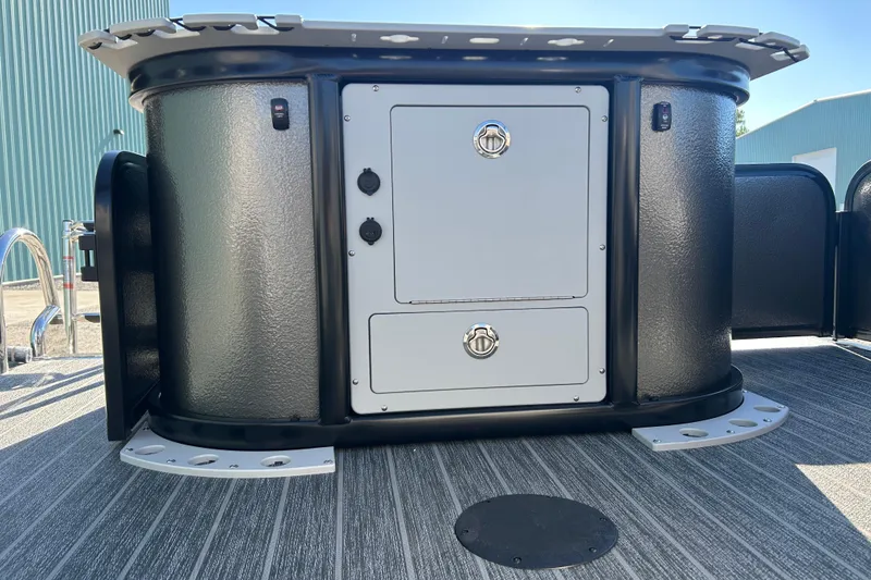 Slide: The Image of 2026 Premier 230 Sunsation Angler 4pt boat storage compartment with sleek design and secure locks. - 37