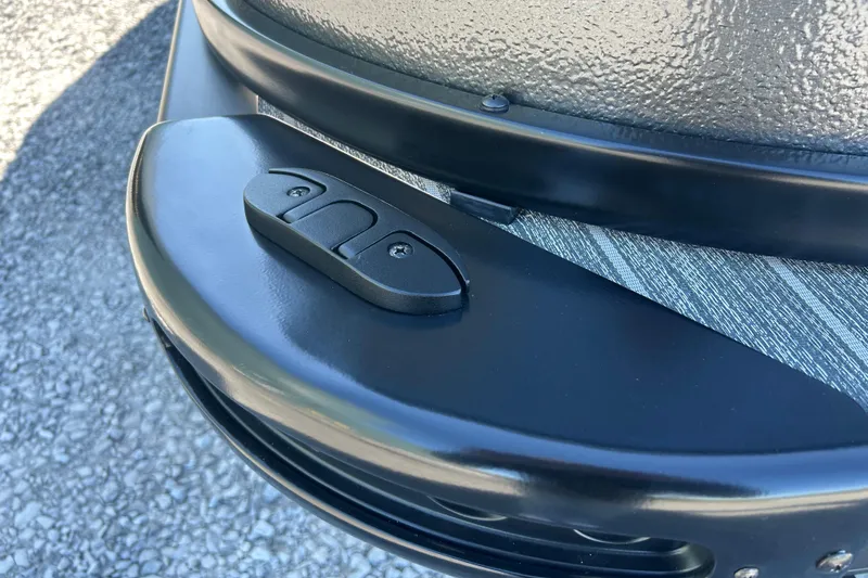 Slide: The Image of Close-up of 2026 Premier 230 Sunsation Angler 4pt boat detail, featuring sleek black trim. - 44