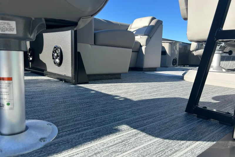 Slide: The Image of Interior view of 2026 Premier 230 Sunsation Angler 4pt boat with seating and carpet. - 5