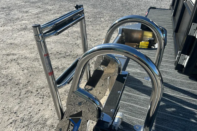 Slide: The Image of Stainless steel ladder on 2026 Premier 230 Sunsation Angler 4pt boat, outdoor setting. - 7