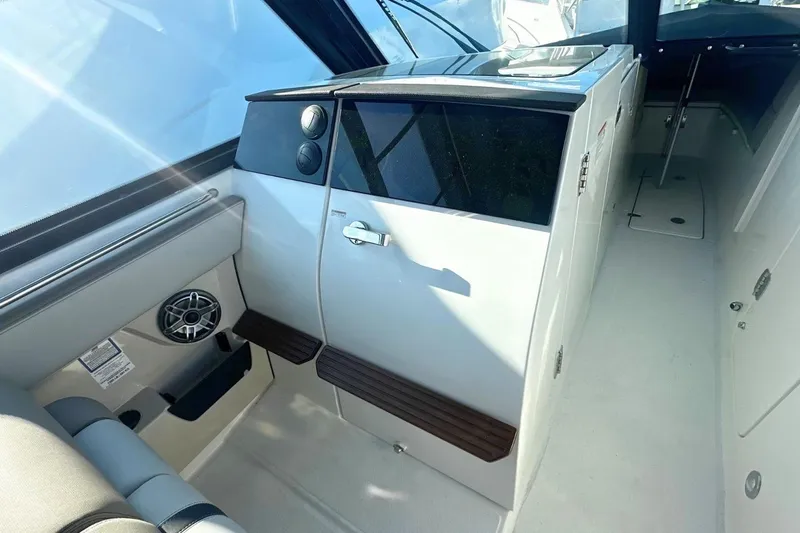 Slide: The Image of Interior view of 2026 Boston Whaler 330 Vantage boat, featuring sleek design and modern amenities. - 21