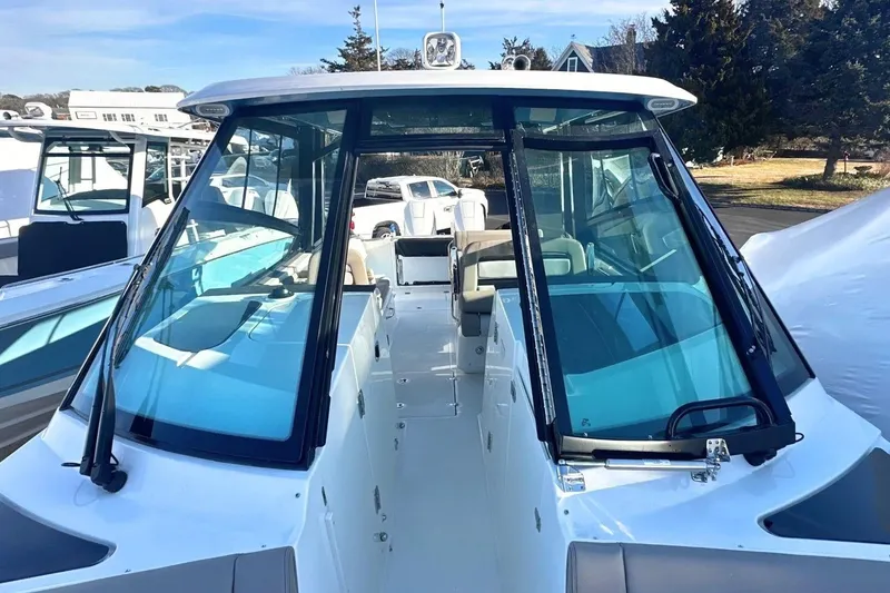 Slide: The Image of 2026 Boston Whaler 330 Vantage boat with sleek design and spacious interior. - 31