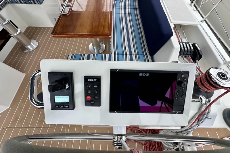 Slide: The Image of Control panel on 2020 Bavaria C50 yacht with navigation and seating area. - 37