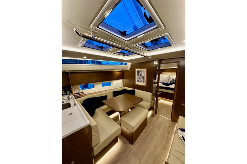 Slide: The Image of Luxurious interior of 2020 Bavaria C50 yacht with modern seating and skylights. - 66