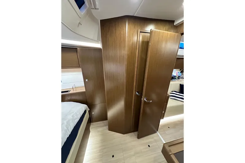 Slide: The Image of Interior of 2020 Bavaria C50 yacht, featuring wooden doors and modern design elements. - 74