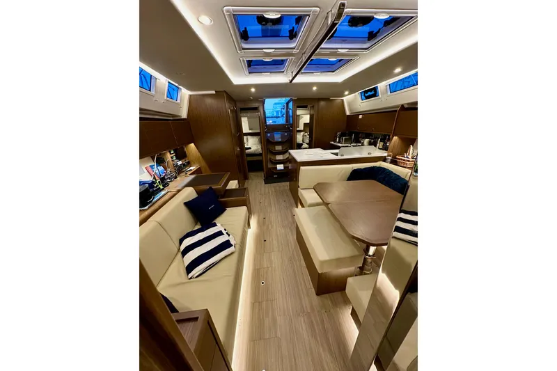 Slide: The Image of Luxurious interior of 2020 Bavaria C50 yacht with modern furnishings and ambient lighting. - 77