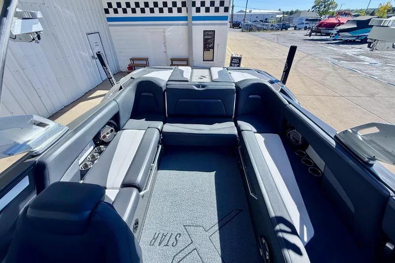 Slide: The Image of 2020 MasterCraft XStar boat interior with spacious seating and modern design. - 17