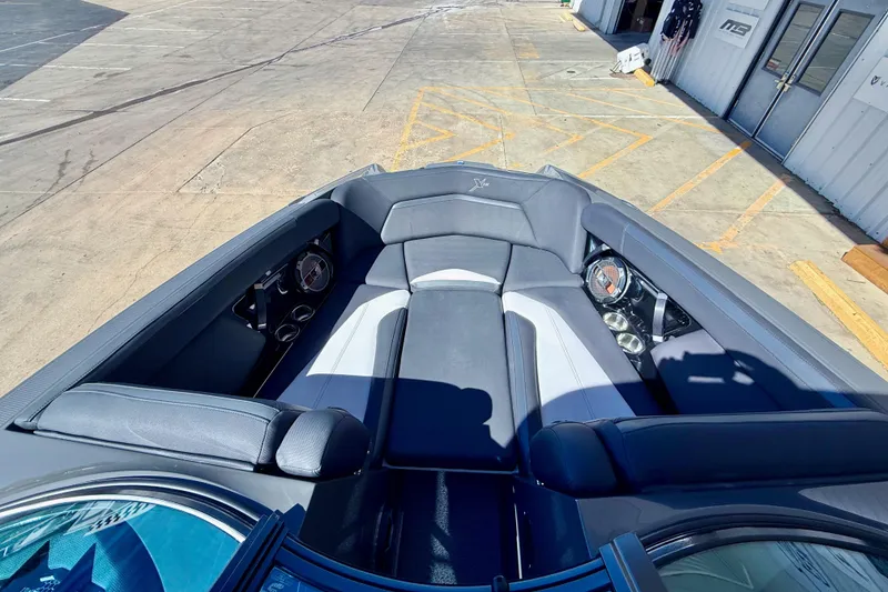 Slide: The Image of 2020 MasterCraft XStar boat interior with sleek seating and modern design. - 18