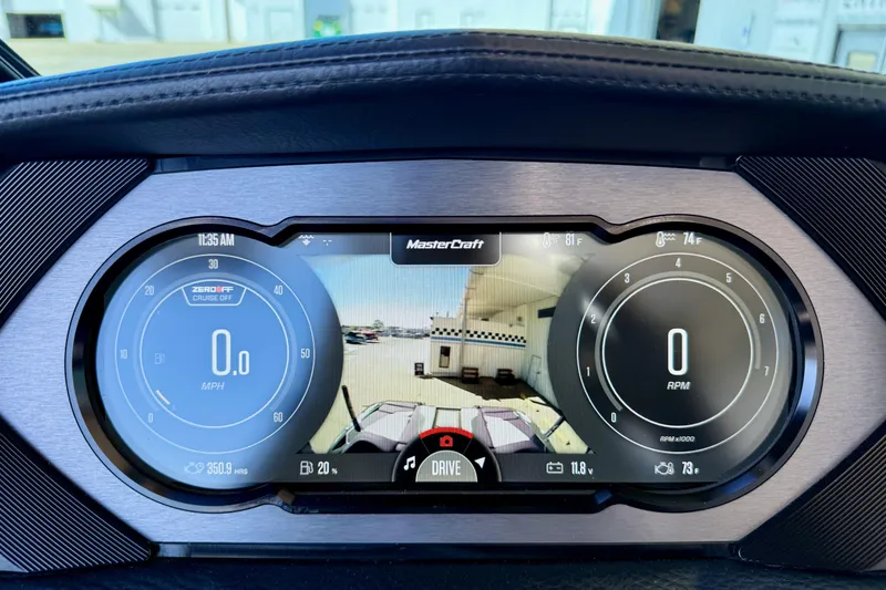 Slide: The Image of Dashboard of a 2020 MasterCraft XStar boat displaying speed, RPM, and rearview camera. - 20