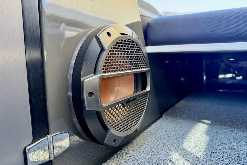 Slide: The Image of Close-up of a speaker in a 2020 MasterCraft XStar boat interior. - 31