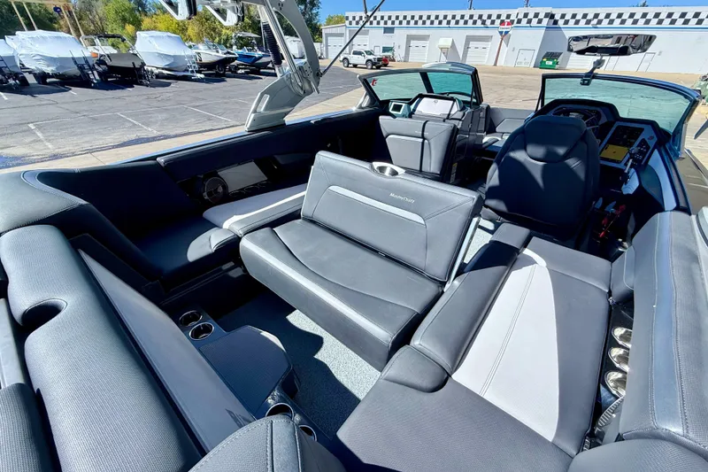 Slide: The Image of 2020 MasterCraft XStar boat interior with luxurious seating and modern design. - 33