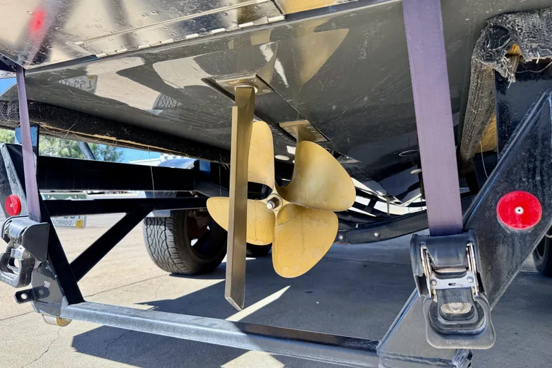 Slide: The Image of Propeller and trailer of a 2020 MasterCraft XStar boat, close-up view. - 7