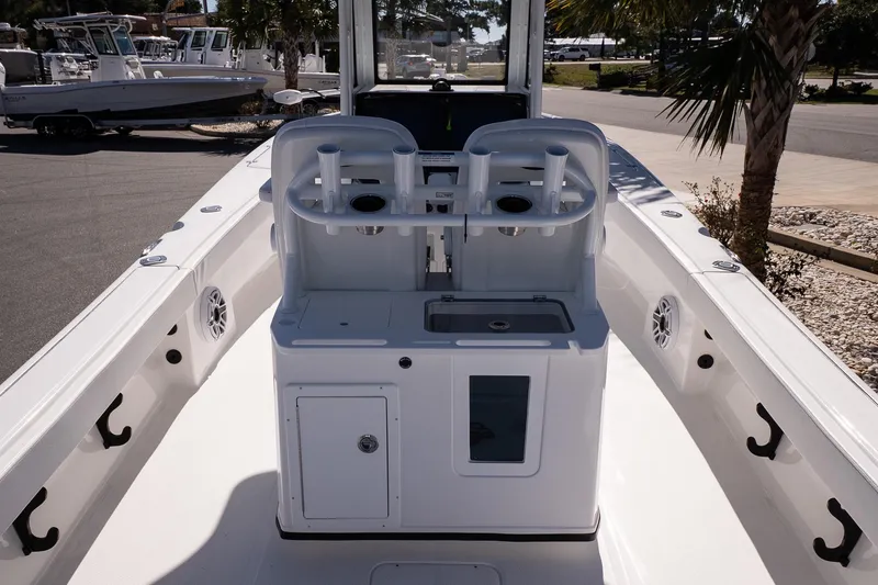 Slide: The Image of 2026 Blazer Bay Makaira 2800 boat interior with rod holders and storage compartments. - 14