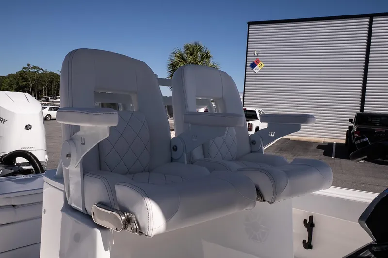 Slide: The Image of Luxury seating on 2026 Blazer Bay Makaira 2800 boat, featuring white cushioned chairs. - 19