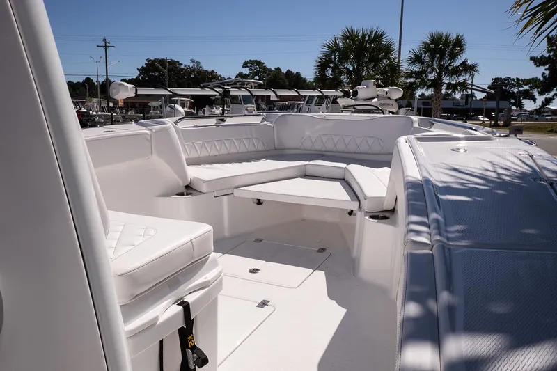 Slide: The Image of 2026 Blazer Bay Makaira 2800 boat interior with white seating and modern design. - 22