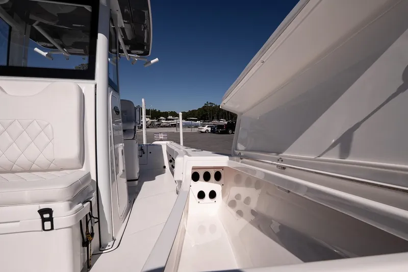 Slide: The Image of 2026 Blazer Bay Makaira 2800 boat interior with seating and storage compartments. - 26