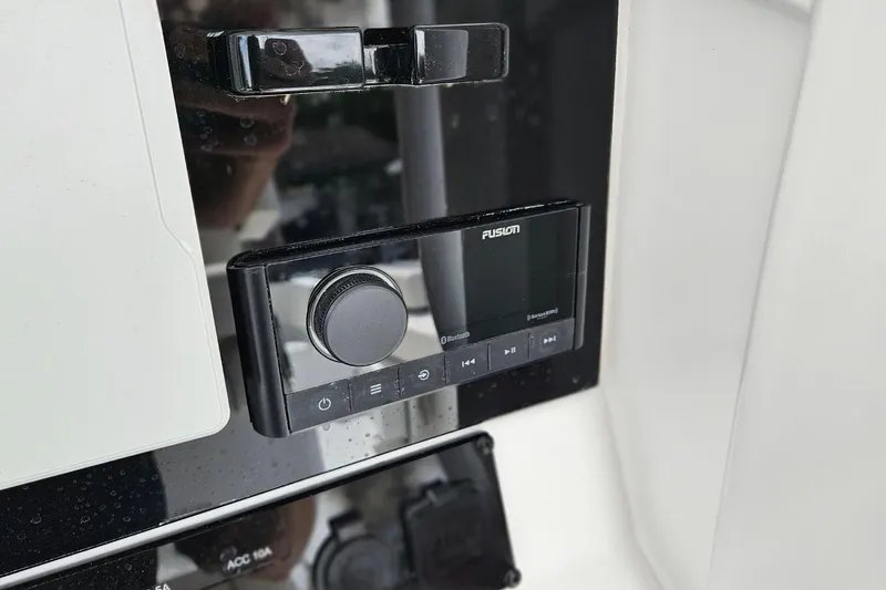 Slide: The Image of Fusion audio system on 2026 Sea Hunt Ultra 305 SE boat dashboard. - 15