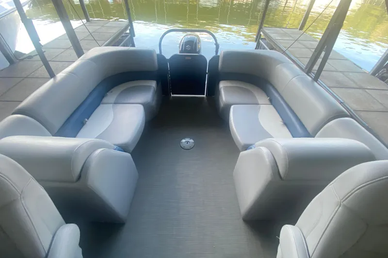 Slide: The Image of 2019 Manitou Aurora LE 23 RF VP pontoon boat interior with spacious seating. - 22
