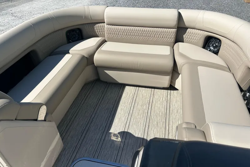 Slide: The Image of Luxurious seating on 2026 Premier 230 Solaris RF boat, featuring beige upholstery and spacious layout. - 13