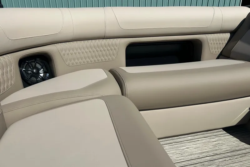 Slide: The Image of Luxurious seating in the 2026 Premier 230 Solaris RF boat, featuring elegant beige upholstery. - 16