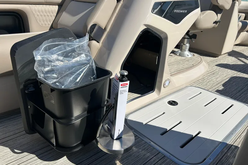 Slide: The Image of Interior of 2026 Premier 230 Solaris RF boat with seating and storage features. - 30