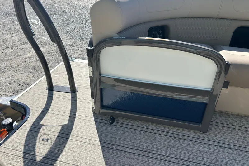 Slide: The Image of 2026 Premier 230 Solaris RF boat interior with open gate and seating area. - 34