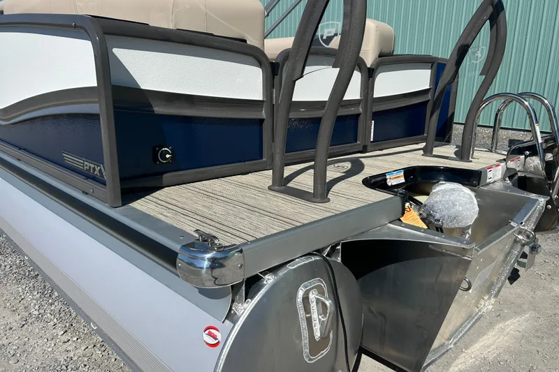 Slide: The Image of 2026 Premier 230 Solaris RF pontoon boat, rear view with sleek design and sturdy construction. - 9