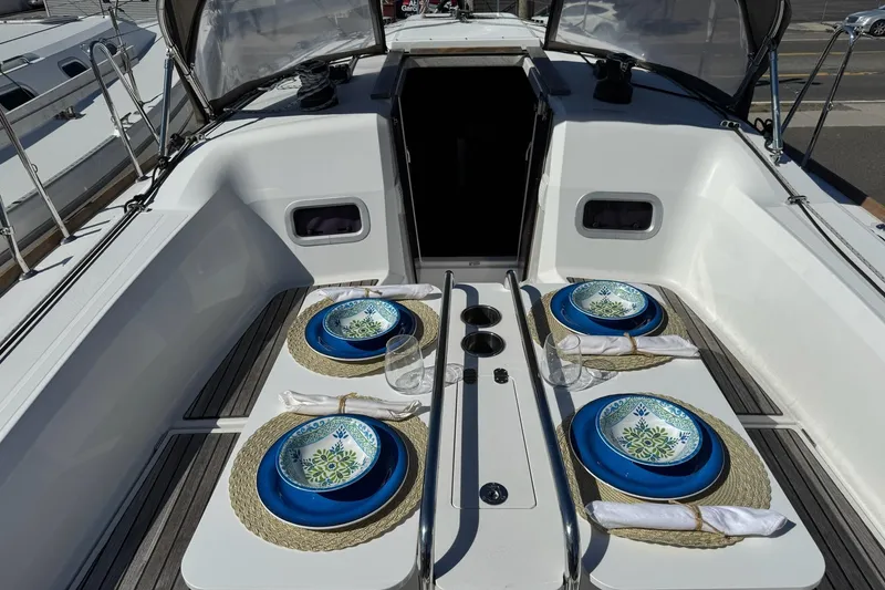 Slide: The Image of Elegant dining setup on Jeanneau Sun Odyssey 349 yacht, 2020 model. - 12