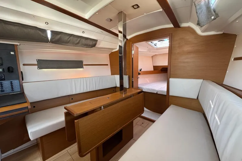Slide: The Image of Interior of 2020 Jeanneau Sun Odyssey 349 sailboat, featuring cozy seating and modern design. - 24