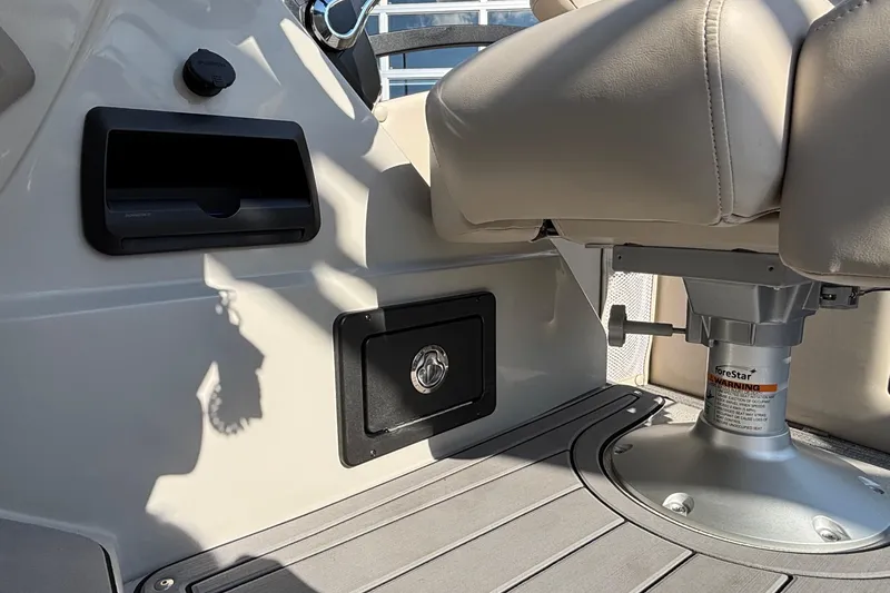 Slide: The Image of Interior of 2026 JC Neptoon 25TT Sport boat with seating and storage compartments. - 23