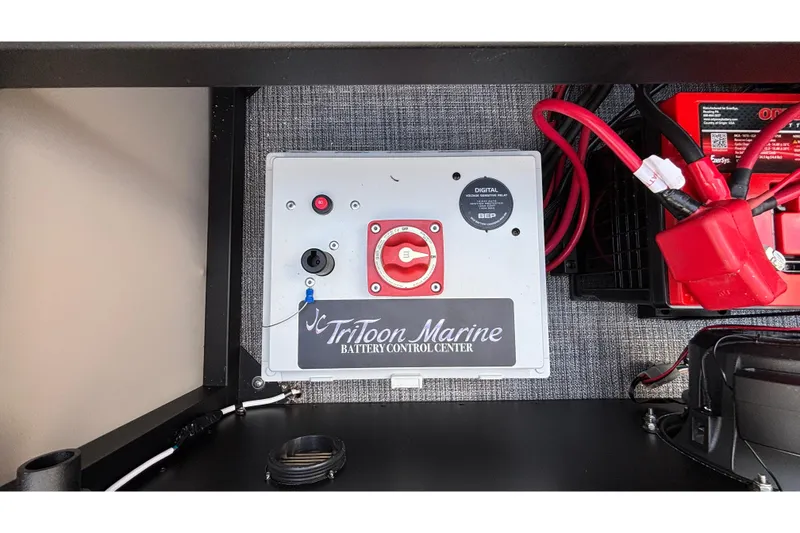 Slide: The Image of Battery control center of 2026 JC Neptoon 25TT Sport with wiring and switches. - 39