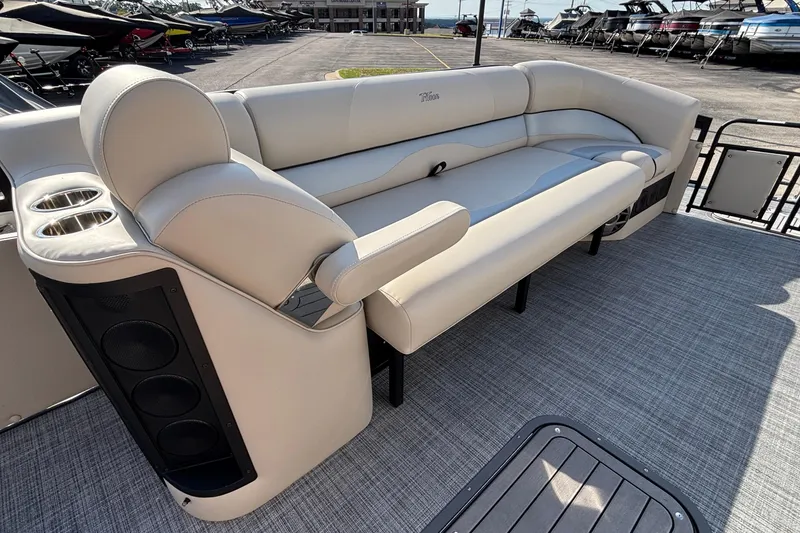 Slide: The Image of Luxurious seating on 2026 JC Neptoon 25TT Sport pontoon boat with cup holders and speakers. - 8