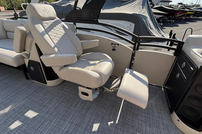 Slide: The Image of Luxurious seating on 2026 JC Neptoon 25TT Sport pontoon boat, featuring plush upholstery and modern design. - 16