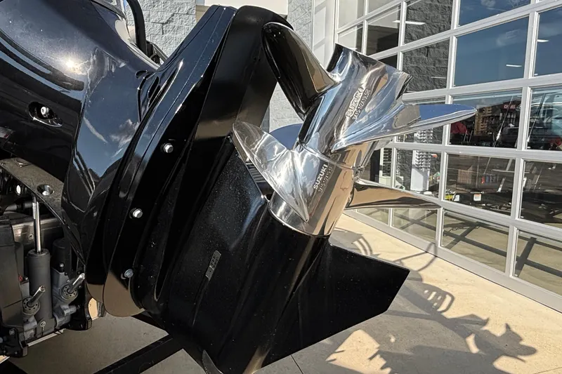 Slide: The Image of Close-up of a 2026 JC Neptoon 25TT Sport boat motor and propeller. - 33