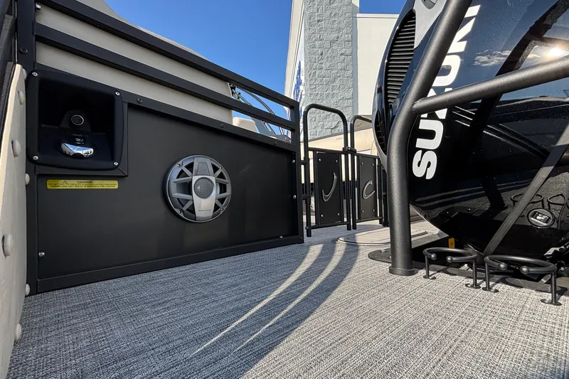 Slide: The Image of 2026 JC Neptoon 25TT Sport boat interior with speaker and railing details. - 34