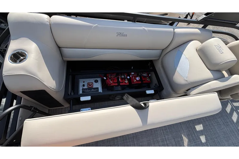 Slide: The Image of 2026 JC Neptoon 25TT Sport boat interior with storage compartment and seating. - 37