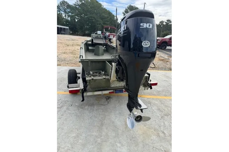 Slide: The Image of 2018 Encore Boat Works 18 with Suzuki 90 outboard motor on trailer. - 3