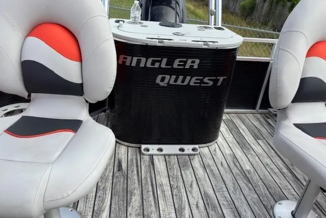 Slide: The Image of 2021 Apex Marine 822 Angler Quest Family Fish boat interior with stylish seating and console. - 11