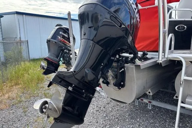 Slide: The Image of 2021 Apex Marine 822 Angler Quest Family Fish boat with dual outboard motors. - 3