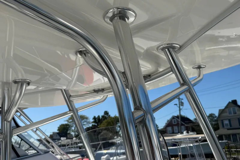 Slide: The Image of 2017 Regulator 25 boat with stainless steel T-top frame detail. - 23