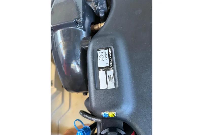 Slide: The Image of Close-up of a 2010 Cobalt 296 engine with Volvo Penta label. - 30