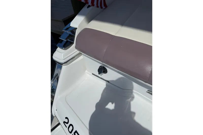 Slide: The Image of 2010 Cobalt 296 boat seat and deck detail with shadow. - 45