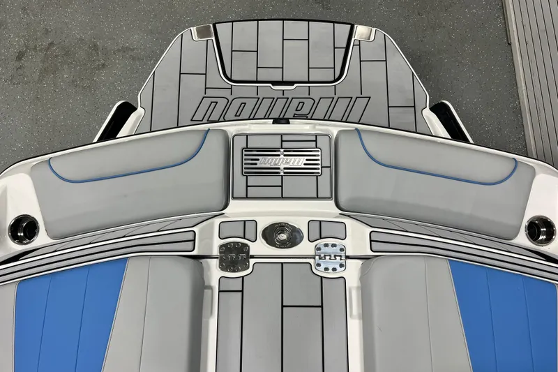 Slide: The Image of 2024 Malibu Wakesetter 24 MXZ boat deck with gray and blue accents. - 16